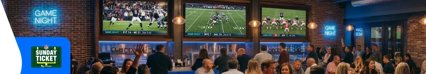 People gathered at a sports bar watching football games displayed on large televisions. Featuring the NFL sunday ticket everpass logo.